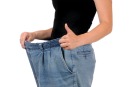 woman with oversize jeans weight loss