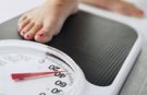 foot on weight loss scales
